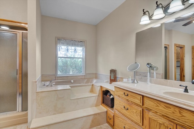 bathroom with tile flooring, independent shower and bath, ceiling fan, and vanity