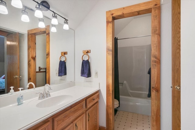 full bathroom with oversized vanity, shower / tub combo with curtain, tile floors, toilet, and vaulted ceiling