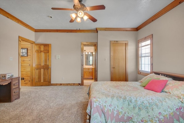 carpeted bedroom featuring ceiling fan, connected bathroom, and ornamental molding