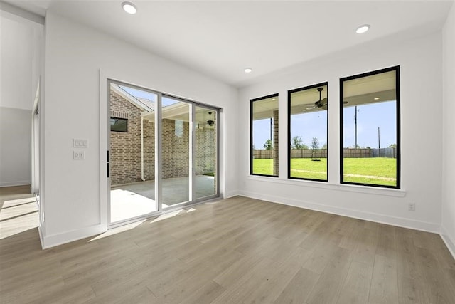 unfurnished room featuring light hardwood / wood-style flooring