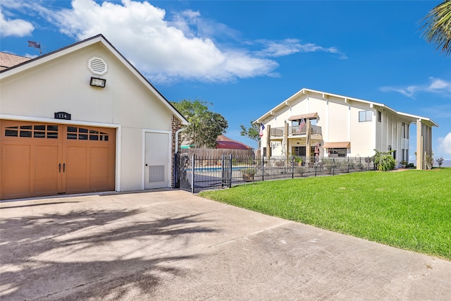 view of side of home with a lawn