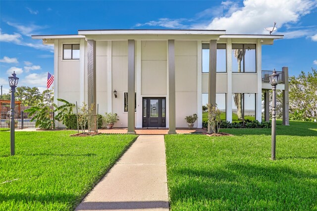 view of front of home with a front yard