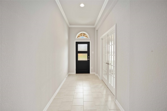 entryway featuring light tile patterned floors, french doors, and crown molding