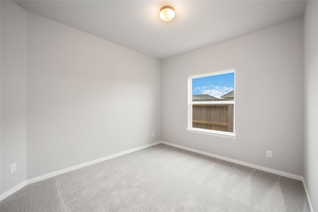 empty room with carpet flooring