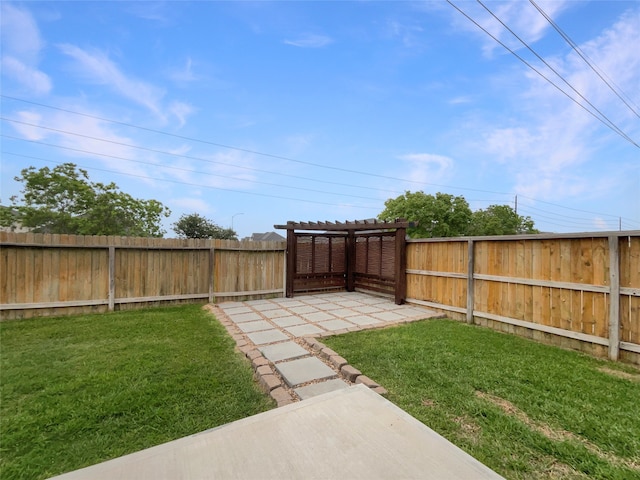 view of yard featuring a patio and a pergola