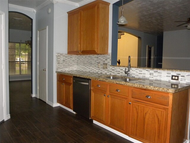 kitchen with black dishwasher, arched walkways, dark wood-style floors, decorative light fixtures, and a sink