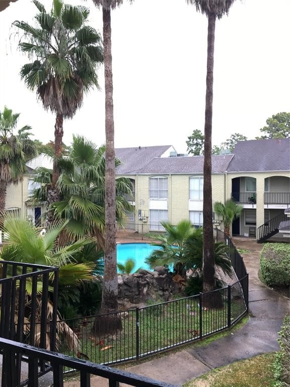 view of front of home featuring a balcony