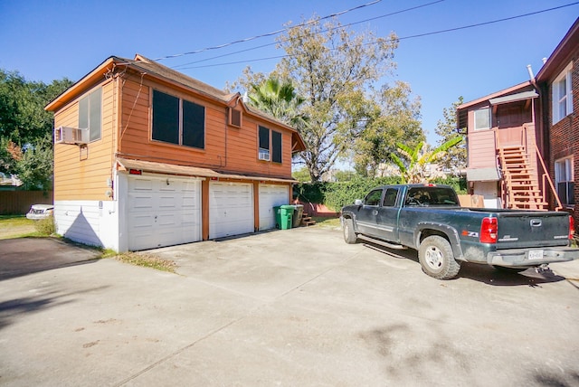 view of property exterior featuring a garage