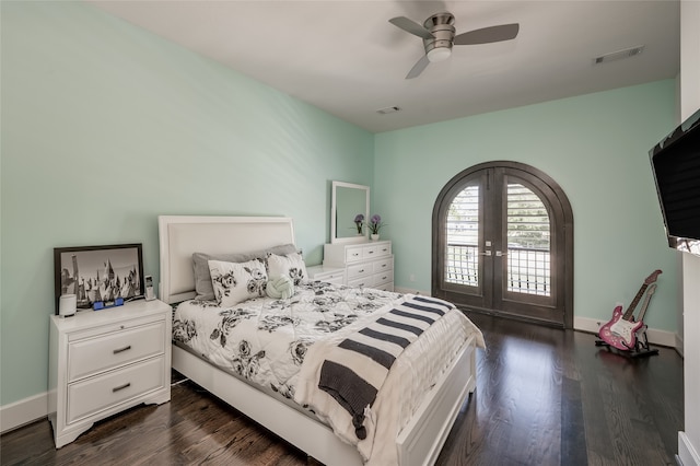 bedroom featuring dark hardwood / wood-style floors, french doors, ceiling fan, and access to exterior