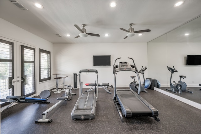 workout area with french doors and ceiling fan