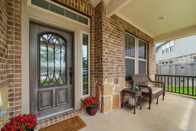 doorway to property featuring a porch