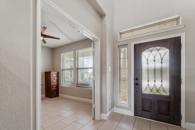 foyer with ceiling fan