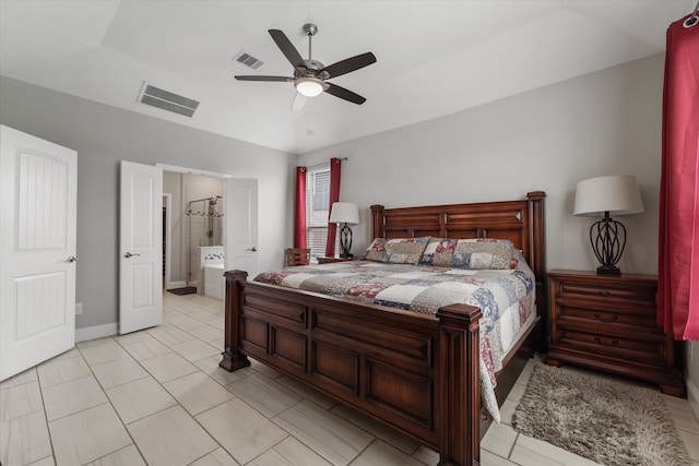 tiled bedroom featuring connected bathroom and ceiling fan