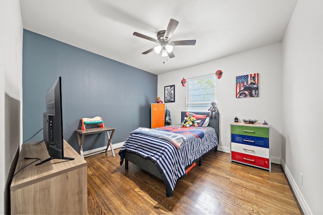 bedroom featuring wood-type flooring and ceiling fan