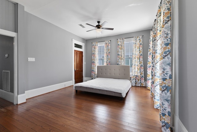 bedroom featuring wood-type flooring and ceiling fan