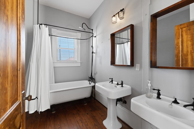 bathroom with sink and hardwood / wood-style floors