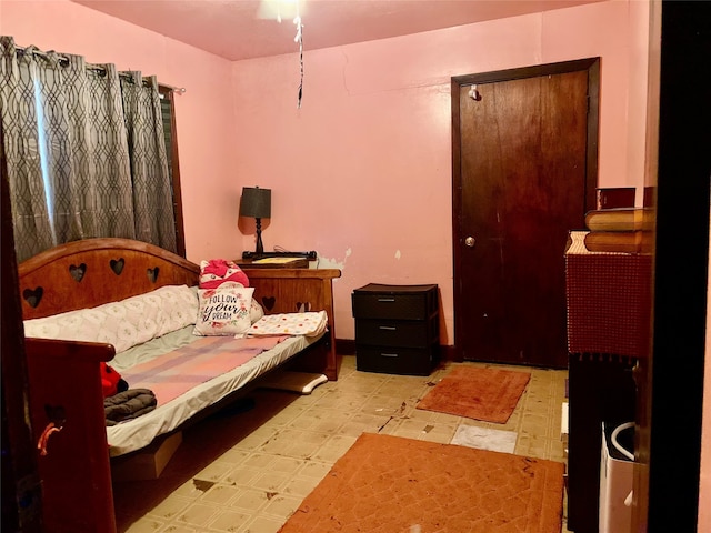 bedroom with tile flooring