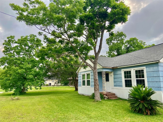 view of front of house with a front yard