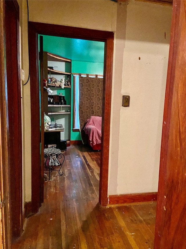 corridor featuring hardwood / wood-style flooring