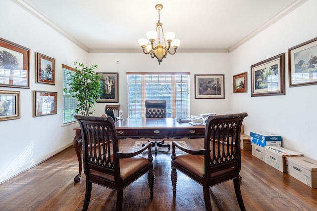 dining space featuring a chandelier, ornamental molding, a healthy amount of sunlight, and dark wood-type flooring