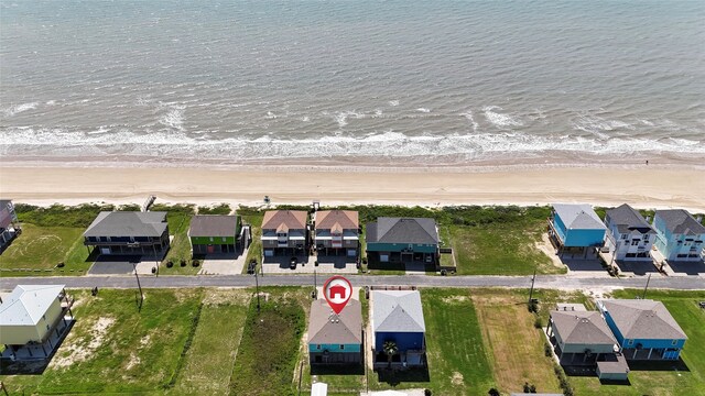 bird's eye view with a beach view and a water view