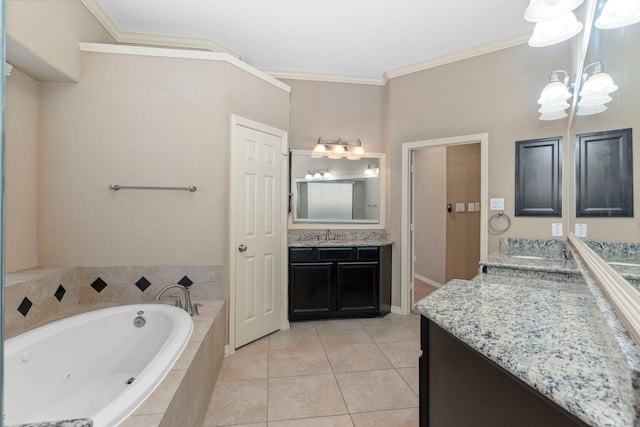 bathroom with tile flooring, tiled tub, vanity, and crown molding