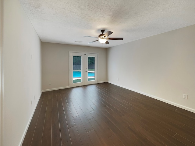 unfurnished room featuring dark hardwood / wood-style floors, french doors, ceiling fan, and a textured ceiling