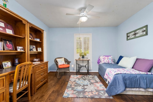 bedroom with ceiling fan and dark hardwood / wood-style floors