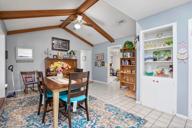 tiled dining space featuring ceiling fan and vaulted ceiling with beams