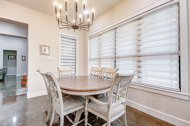 dining room featuring a notable chandelier