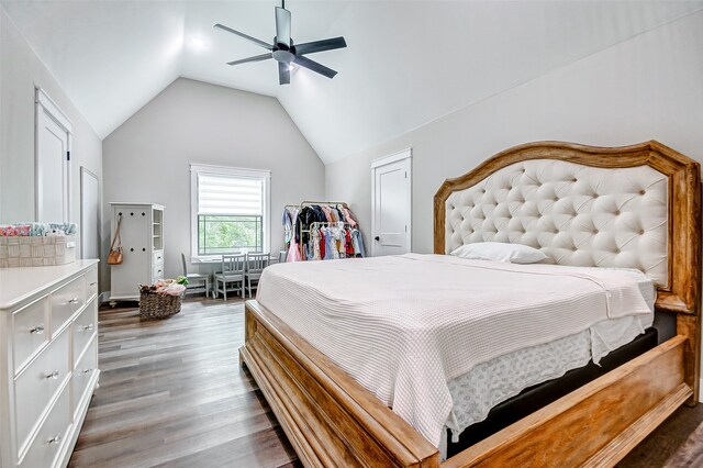 bedroom featuring vaulted ceiling, ceiling fan, and dark wood-type flooring