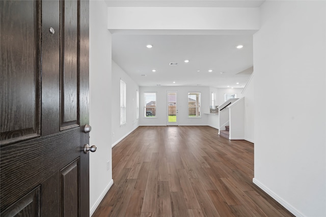 entrance foyer featuring dark hardwood / wood-style floors