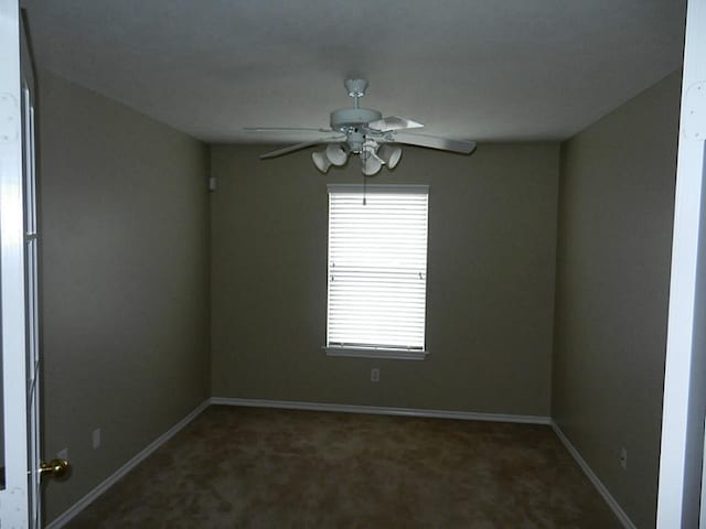 carpeted empty room with ceiling fan