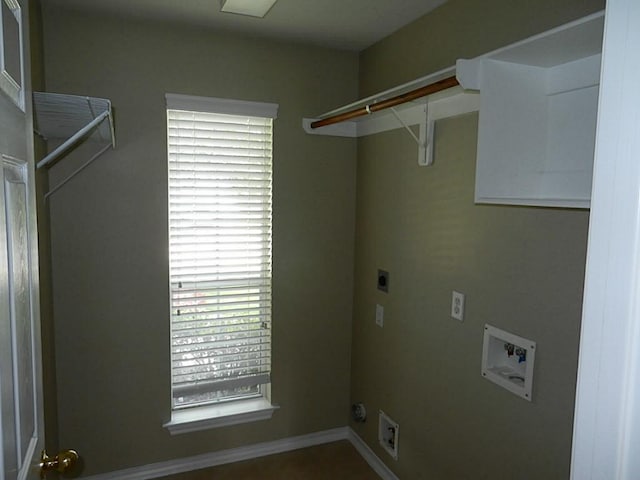 laundry area with hookup for a washing machine and electric dryer hookup