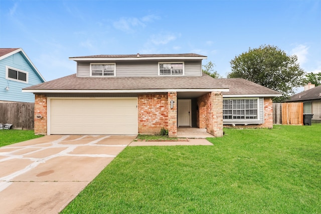 front facade featuring a garage and a front yard