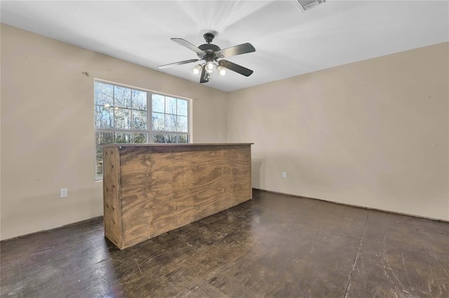 spare room with ceiling fan