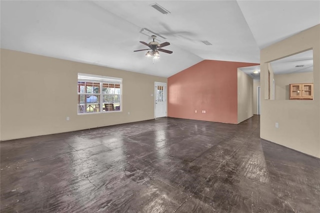 spare room featuring lofted ceiling and ceiling fan