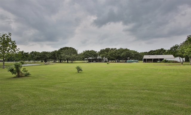 view of nearby features featuring a lawn