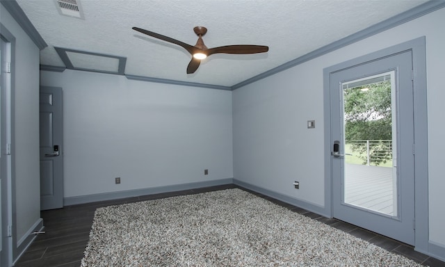 unfurnished room with crown molding, a textured ceiling, dark wood-type flooring, and ceiling fan