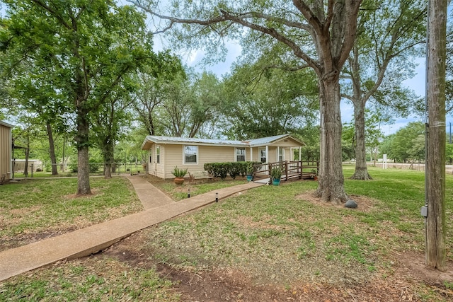 view of front facade with a front lawn