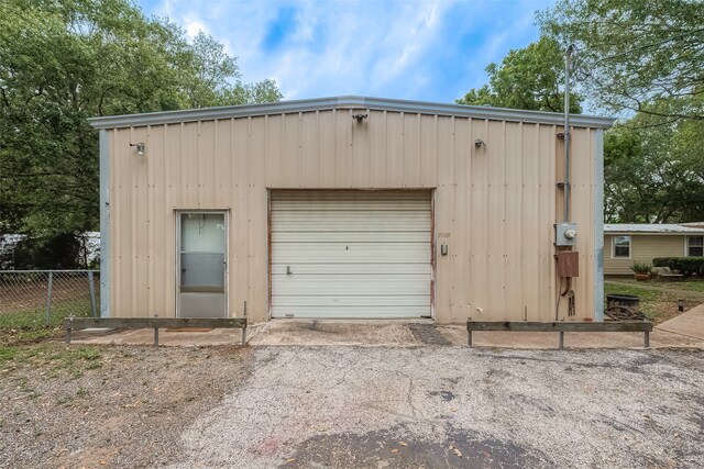 garage with wooden walls