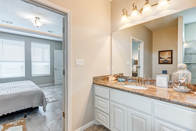 bathroom with oversized vanity and tile floors