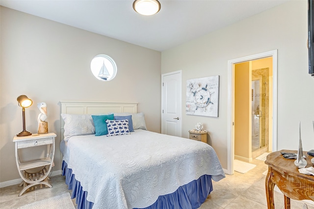 tiled bedroom featuring ensuite bathroom