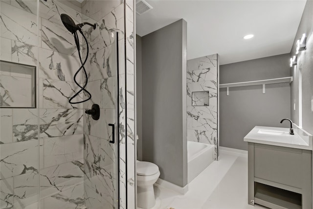 bathroom featuring a shower with shower door, vanity, toilet, and tile flooring