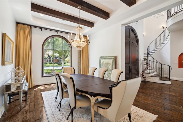 dining area with beamed ceiling, dark hardwood / wood-style flooring, and an inviting chandelier