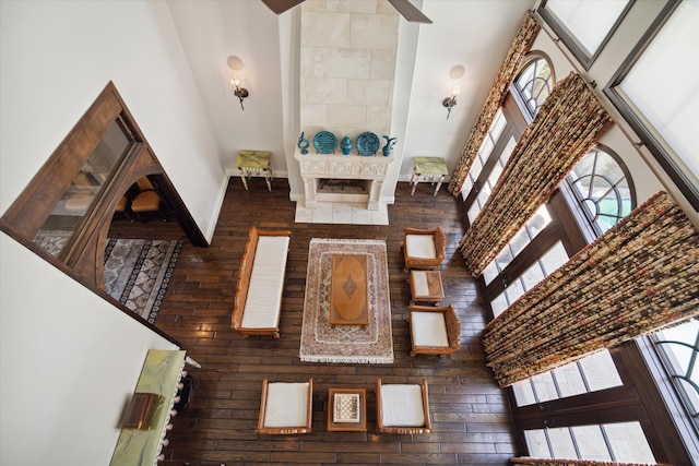 living room featuring a towering ceiling