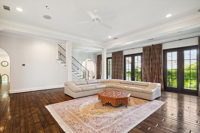 living room featuring french doors, crown molding, dark hardwood / wood-style flooring, and ceiling fan