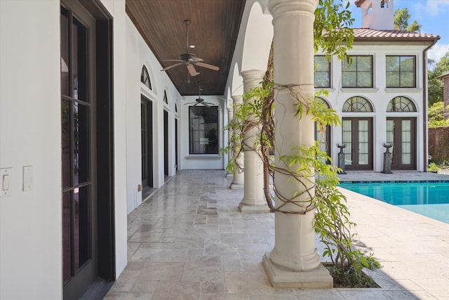 exterior space featuring french doors, ceiling fan, and a patio area