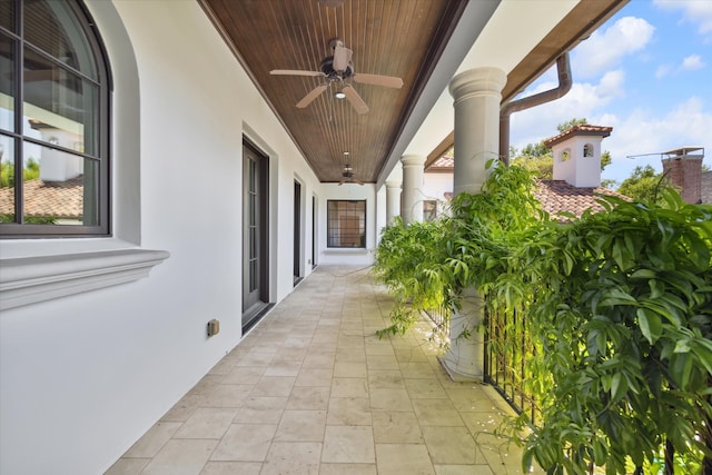 view of patio featuring ceiling fan