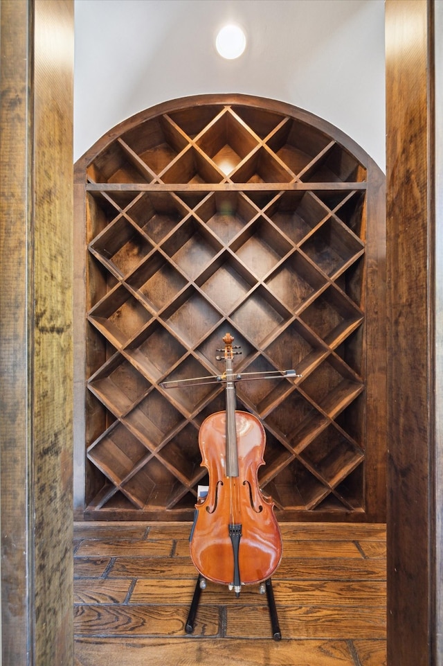 wine room featuring hardwood / wood-style floors